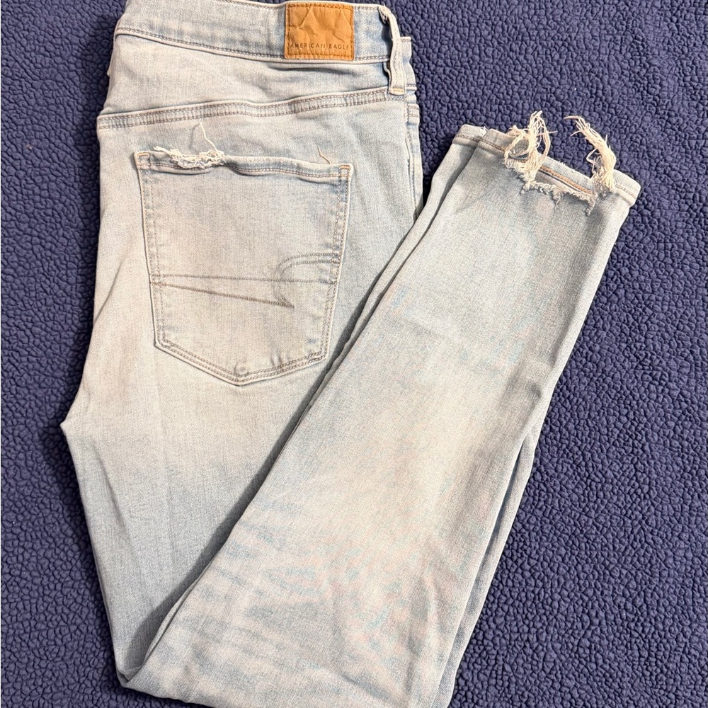 American Eagle Outfitters Light Blue Skinny Jeans with Frayed Hem